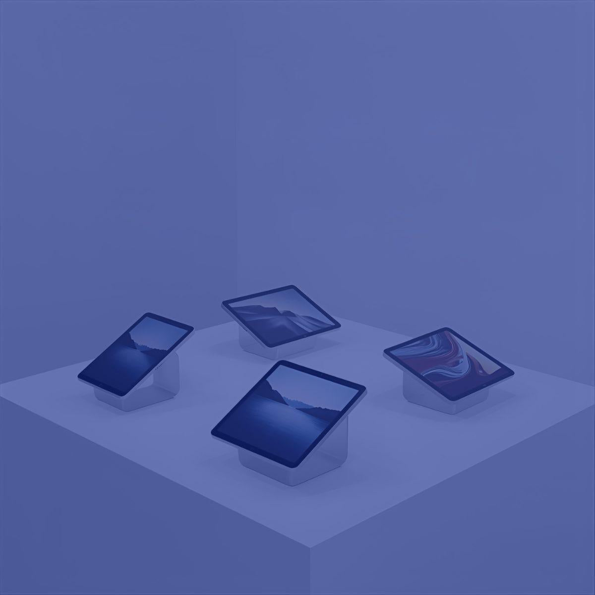 Modern tablets displayed on a clean white retail-style surface, product-focused for DAYMART® collection