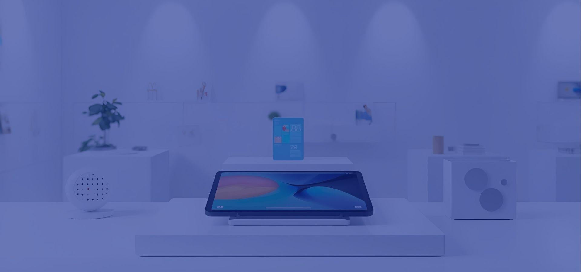 Wide hero banner showing modern tech products on a clean retail-style surface – DAYMART online store